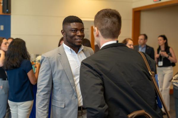 A student speaks to an industry professional at the annual Supply Chain Forum, hosted at the University of Kentucky