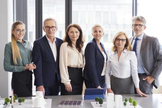 Portrait of business people in conference room stock photo