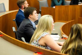professional students listening and observing the current contestants