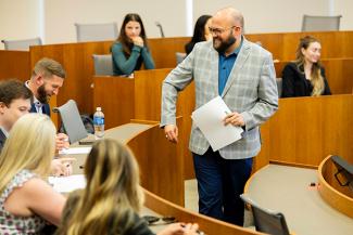 Stephen Lusch, a Gatton Faculty member, interacting with professional students