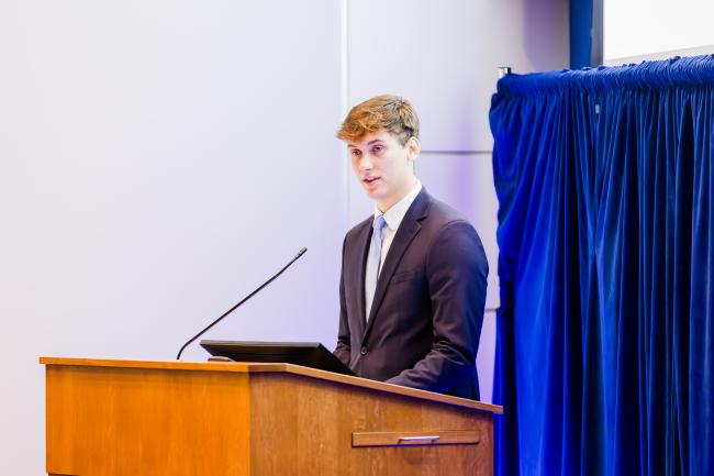 Benjamin Broughton speaks after being honored as the Dean's Award for Excellence recipient