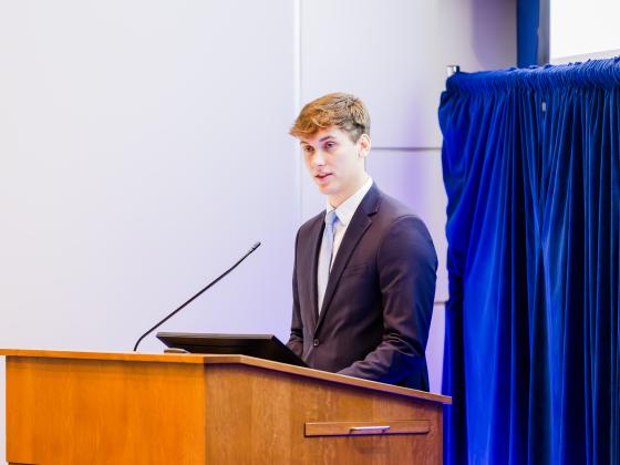 Benjamin Broughton speaks after being honored as the Dean's Award for Excellence recipient