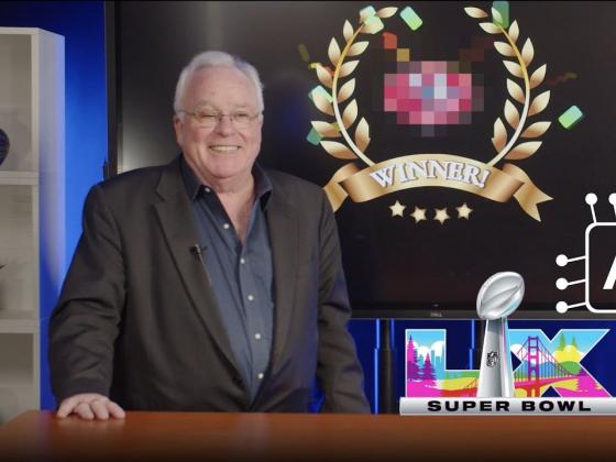 Simon Sheather standing at his desk next to the superbowl logo and AI circuit
