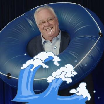 Simon Sheather in an inflatable tube
